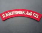 ROYAL NORTHUMBERLAND FUSILIERS CLOTH SHOULDER TITLE