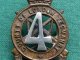 Scarce The 4th County of London Yeomanry Beret Badge.